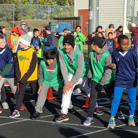 children in elementary lined up at starting line